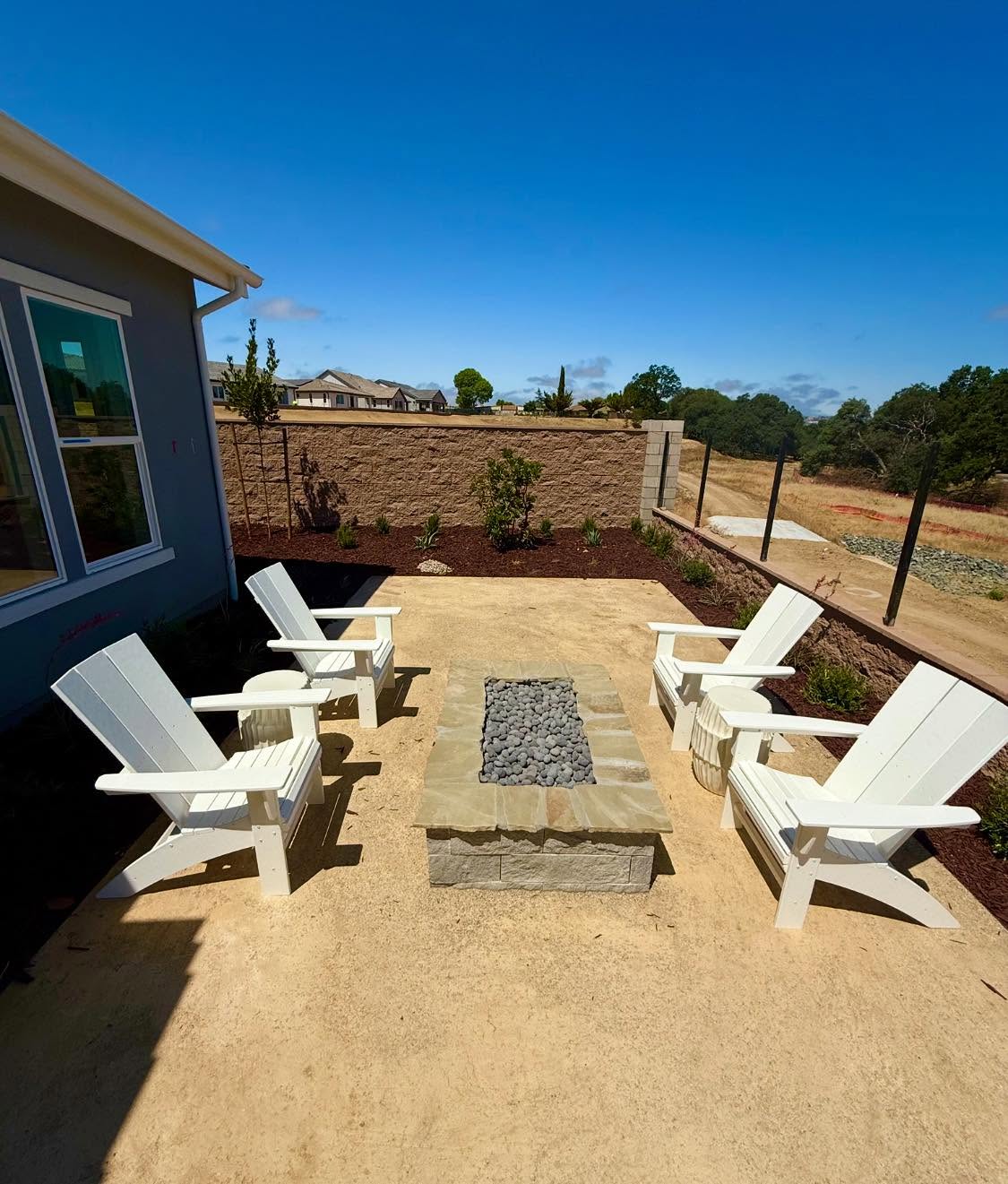 Fire pit with Adirondack chairs